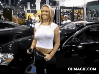 8b9e176b1a8f5efe1afec3ac681b8a51-woman-flexes-boobs
