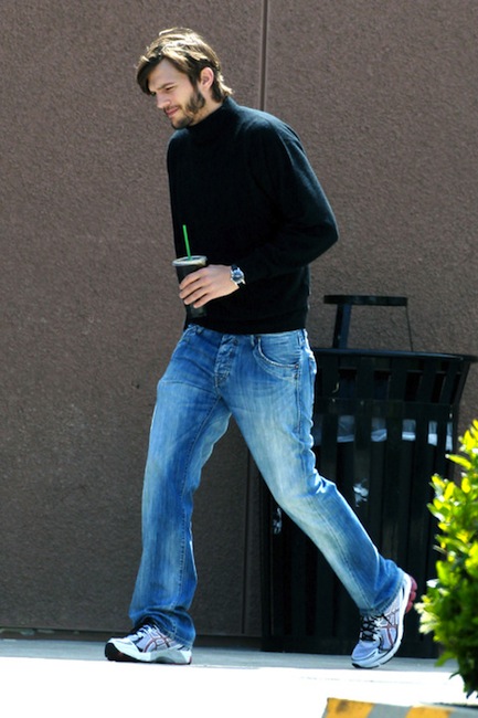 **EXCLUSIVE** Ashton Kutcher looks the spitting image of a young Steve Jobs as he grabs a coffee ahead of the start of filming his upcoming biopic on the late Apple honcho
