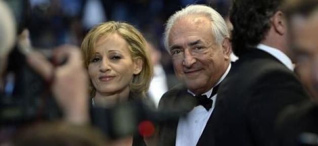 521442-l-ex-president-du-fonds-monetaire-international-dominique-strauss-kahn-en-compagnie-de-myriam-l-aouf