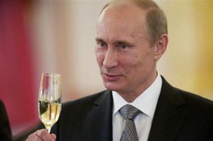 460424-russian-president-vladimir-putin-toasts-during-a-ceremony-in-which-the-diplomatic-credentials-of-new