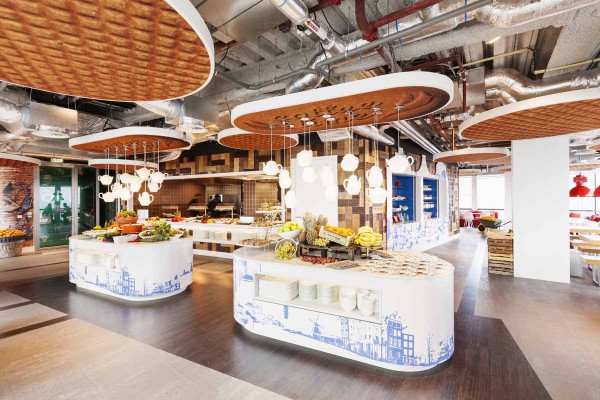 theres-plenty-of-dutch-inspired-design-elements-in-the-kitchen-area-from-the-waffles-and-tea-kettles-hanging-from-the-ceiling-to-the-delft-blue-graphics-on-the-islands