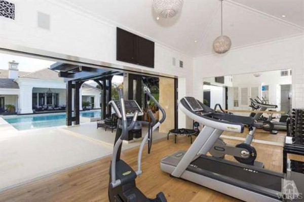 the-gym-overlooks-the-pool-as-well
