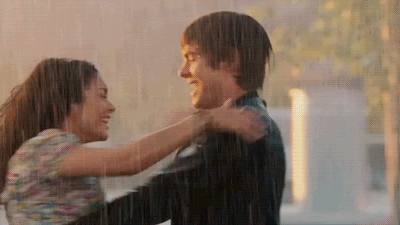 Romantic Couple Dancing in Rain