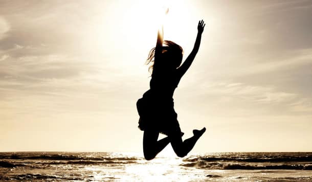 Bonheur-Joie-Femme-Plage