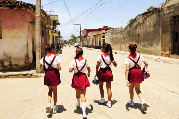 (GERMANY OUT) Cuba Santiago de Cuba - Trinidad: school girls waering school uniform on the way home - 01.06.2009 (Photo by Konzept und Bild/ullstein bild via Getty Images)