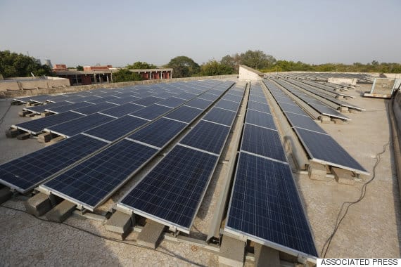 A rooftop solar plant seen at the secretariat building in Gandhinagar, India, Tuesday, May 17, 2016. (AP Photo/Ajit Solanki)