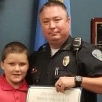 policier adopte enfant battu