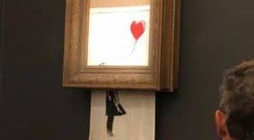 Une-oeuvre-de-Banksy-s-auto-detruit-en-pleine-vente-aux-encheres-a-Londres