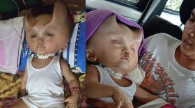 bébé cornes de diables sur la tête