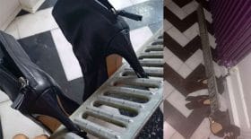 talons dans la grille du caniveau