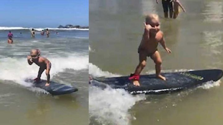 bébé fait du surf vague