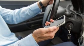 téléphone au volant suspension