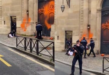 Des militants repeignent la façade de Matignon
