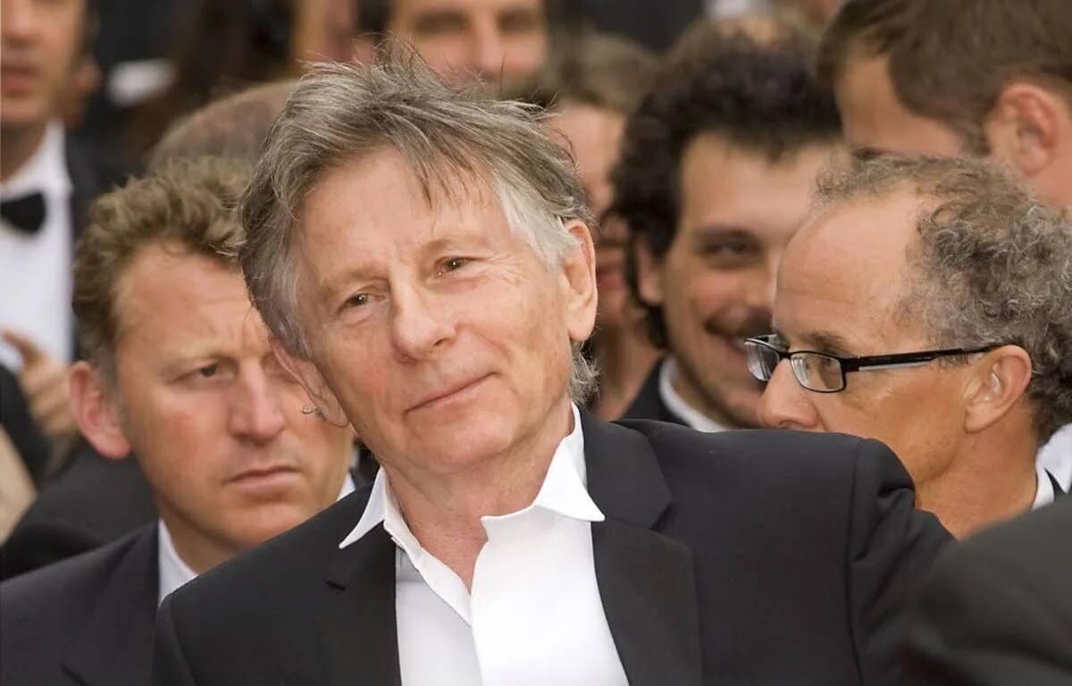 Roman Polanski pose avec une victime