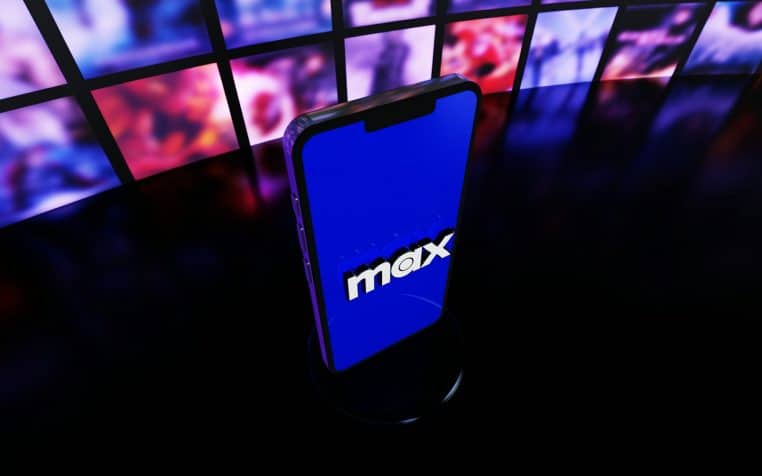 a cell phone that is sitting on a table? HBO max