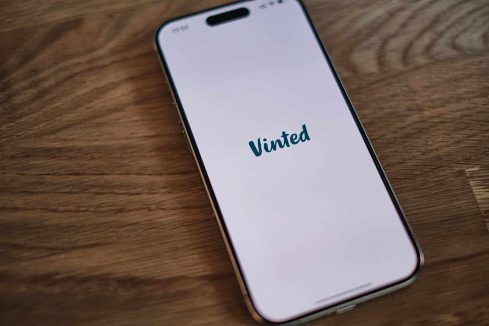 A white iPhone with the word united on it