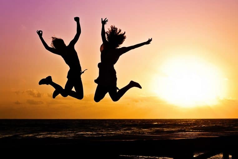 new year background, nature, sunset, beach, silhouettes, jump, jumping, youth, active, happy, pair, girls, young women, people, joy, freedom, seaside, dusk