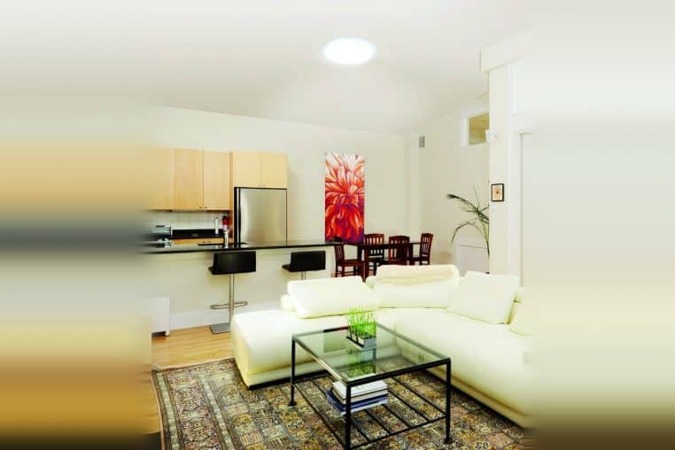 Puits de lumière apportant un éclairage naturel dans un séjour