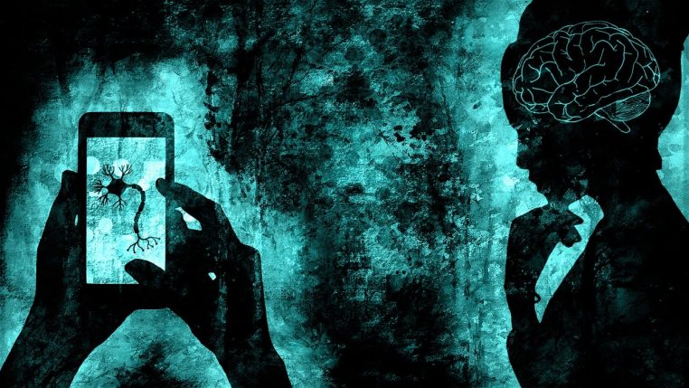 Illustration d’un cerveau relié à un smartphone par des connections lumineuses, symbolisant l’impact du numérique sur l’esprit.
