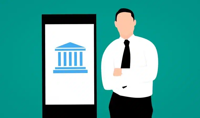 Illustration d’un homme en chemise face à un grand smartphone affichant un bâtiment de banque, symbolisant la montée en puissance des services bancaires en ligne.