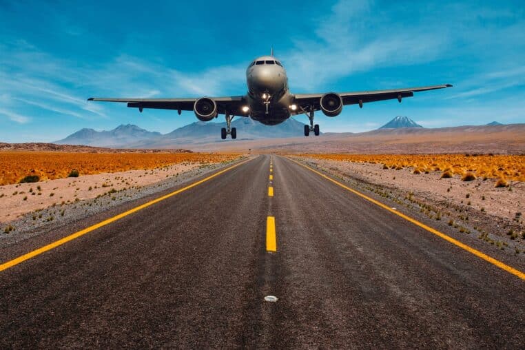 aeroplane, fly, flying, landing, transport, highway, road, nature, sky, artwork, brown sky, brown road, brown plane, brown airplane