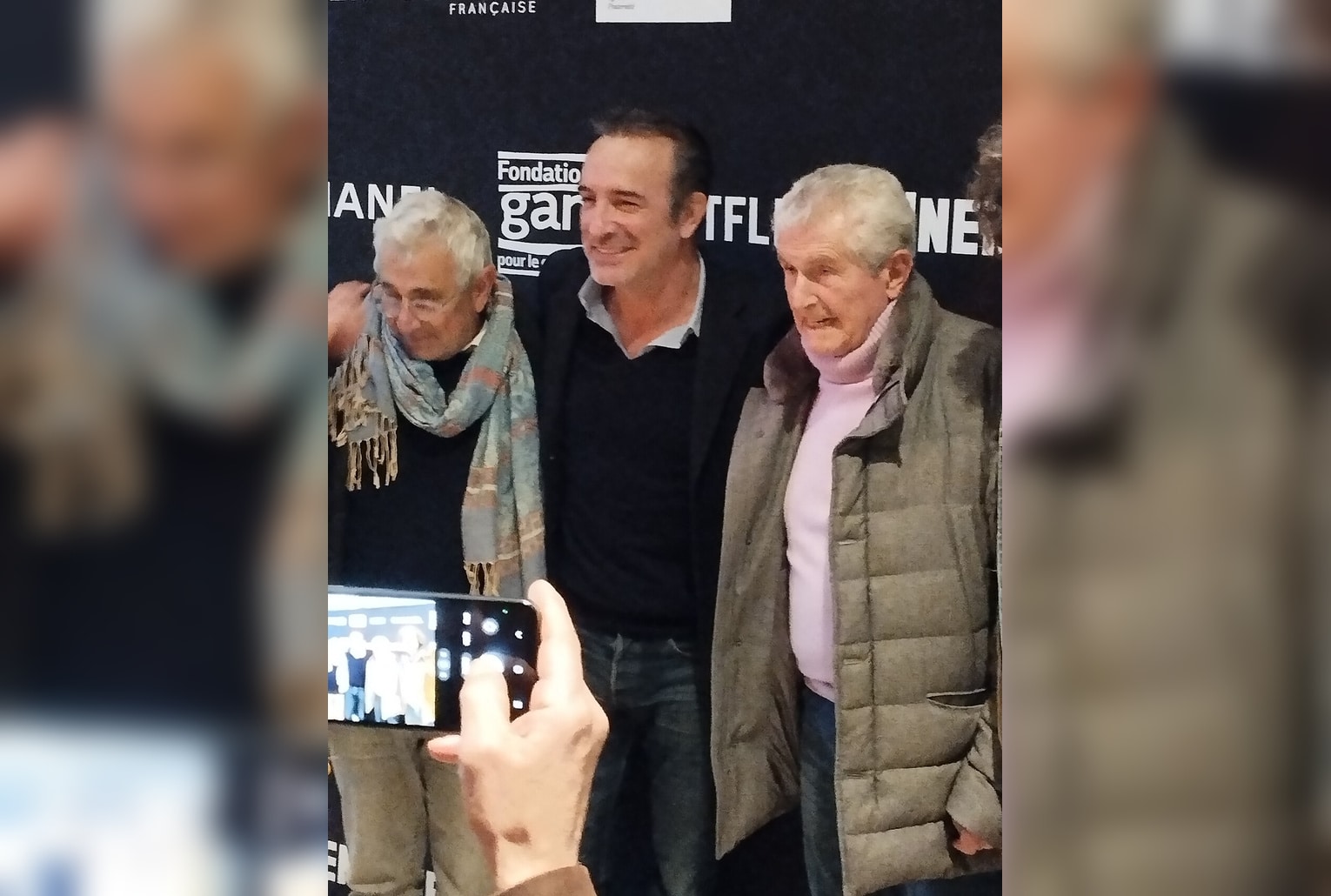 Michel Boujenah, Jean Dujardin et Claude Lelouch réunis lors d’un photocall à Paris (novembre 2024).