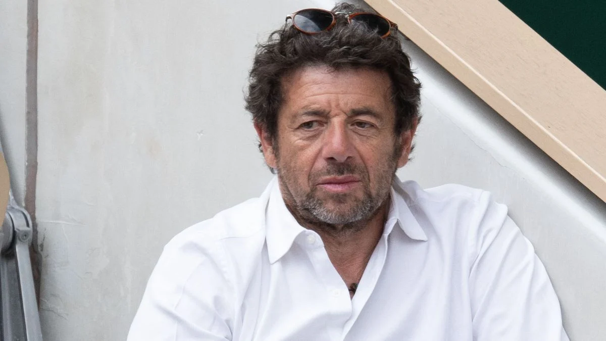 Patrick Bruel, regard sérieux et pensif, lors d'un événement public
