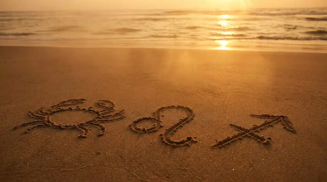 Symboles du zodiaque tracés dans le sable au coucher du soleil